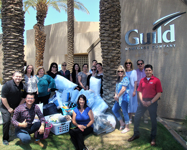 Yuma, AZ Guild Mortgage team with donated items