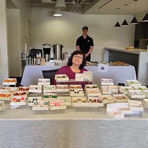 Smiling woman selling jewelry
